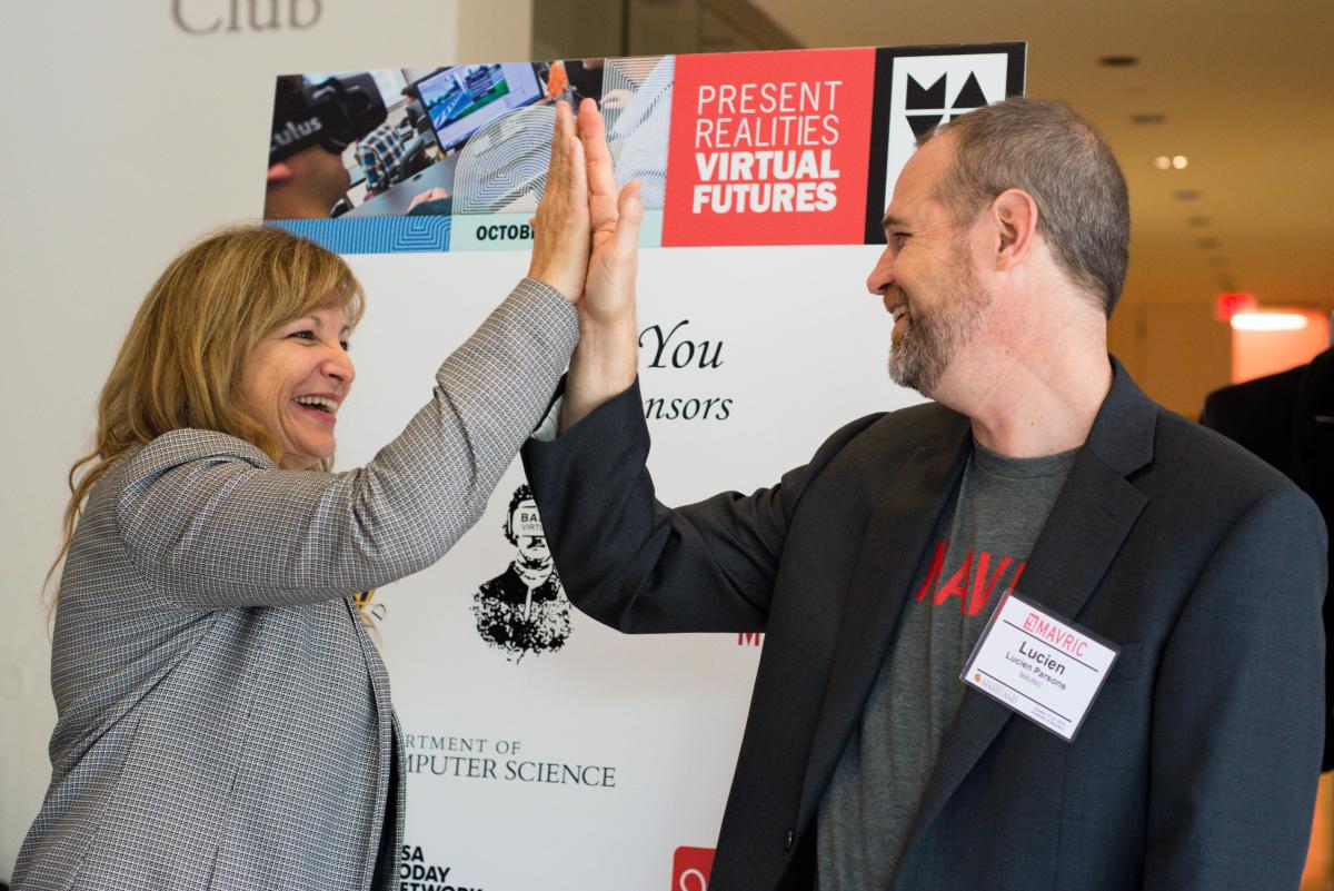 Julie and Lucien high five